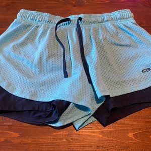 Workout shorts with built in compression shorts. Champion brand size medium